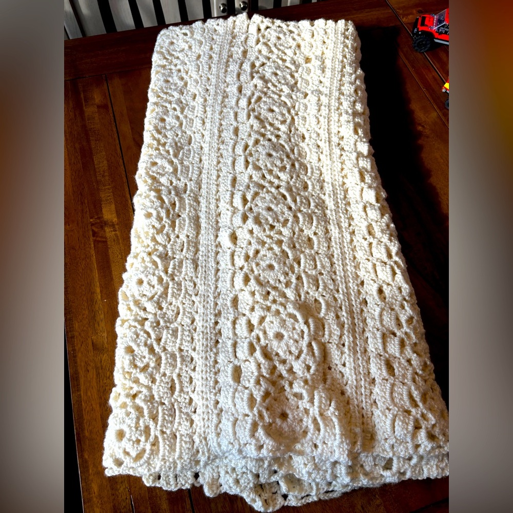 Cream colored homemade baby blanket